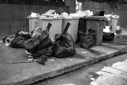 Residents disposing of old furniture in Millbank