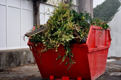 Professional waste management team handling office waste