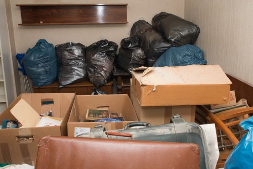 Before and after garden clearance in a Millbank home